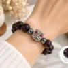 Garnet (โกเมน) คั่น Hematite แต่งชาร์มมู “พญานกถึดทือ” ครูบาเต่า