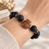 Onyx + Lava Stone คั่น Hematite แต่งชาร์ม ลูกอม “เสือนอนกิน”