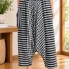 นกฮุก ริมโขง Online Store Image 16 ก.ย. 2569 14_37_00 กางเกงฮาเร็มผ้าฝ้าย ลายขาว–ดำ