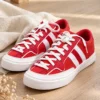 นกฮุก ริมโขง Online Store Image 17 ก.ย. 2569 12_11_07 รองเท้าผ้าใบ Le Coq Sportif Grandville สีแดง–ขาว