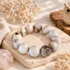 นกฮูก ริมโขง Online Store Image 19 ก.ย. 2569 10_53_12 สร้อยข้อมือ Wood Opal (ไม้กลายเป็นหินเนื้อโอปอล)