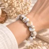 นกฮูก ริมโขง Online Store Image 19 ก.ย. 2569 11_40_16 สร้อยข้อมือ Wood Opal (ไม้กลายเป็นหินเนื้อโอปอล)